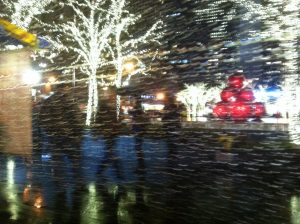 A photo from a Christmas past... 5 years ago in a cab on a rainy night, speeding homeward.